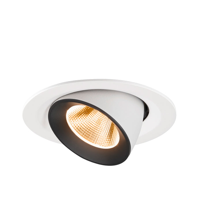 Recessed ceiling light fixture with a white and black finish, made of metal, featuring a warm LED bulb and a modern design.
