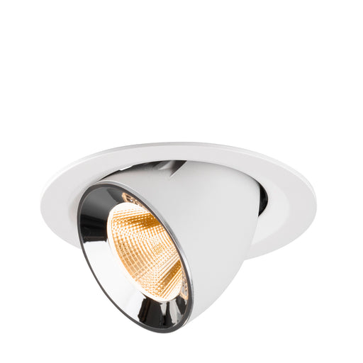 Recessed ceiling light fixture made of metal with a white finish and chrome accents, featuring a warm LED bulb for focused illumination.