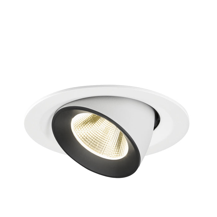 Recessed ceiling light fixture with a white and black finish, made of metal, featuring a cone shape and warm LED illumination.
