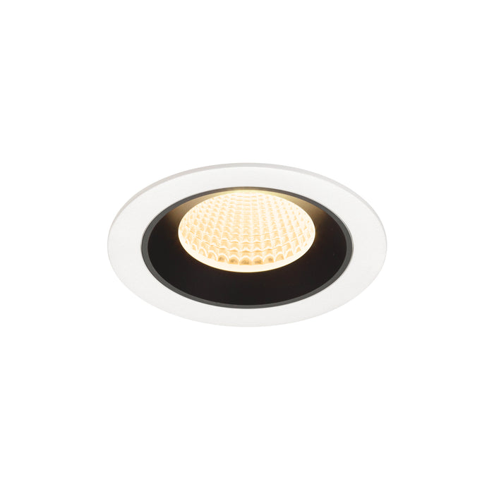 Recessed LED downlight in white metal finish with honeycomb lens, featuring a warm white glow and designed for ceiling mounting.