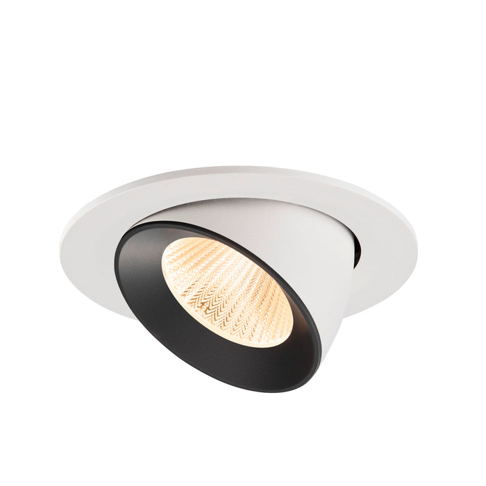 Recessed ceiling light fixture made of metal with a matte white finish and black interior, featuring a textured lens for soft illumination.