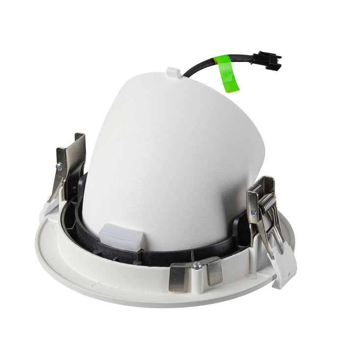 White plastic recessed lighting housing with metal clips and a black wire connector for easy installation.