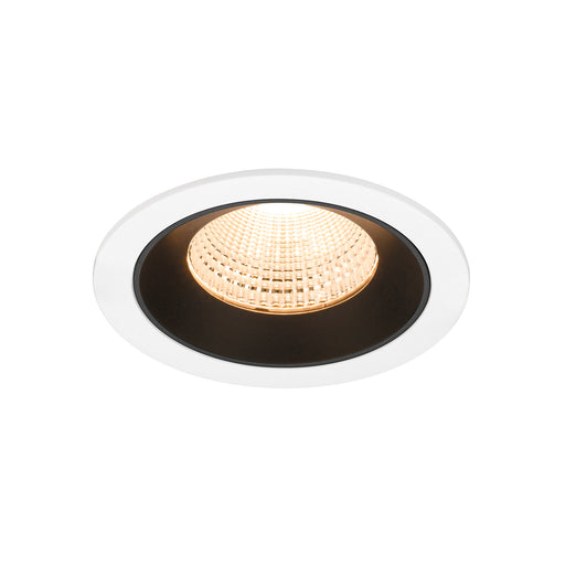 Recessed ceiling light fixture with a white and black finish, featuring a glass lens and warm white LED light source.
