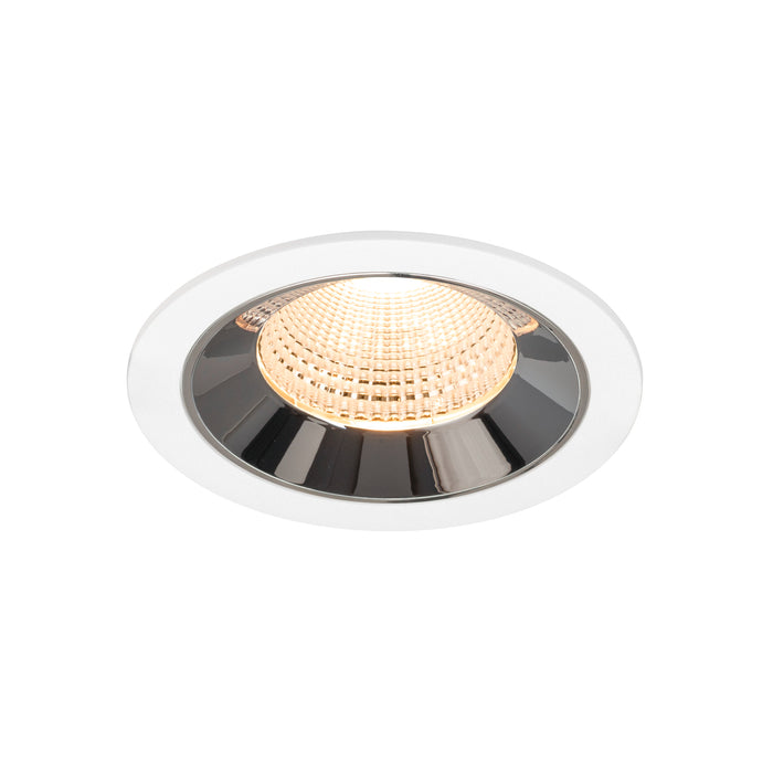 Recessed ceiling light fixture made of metal with a chrome finish, featuring a white trim and warm LED light.