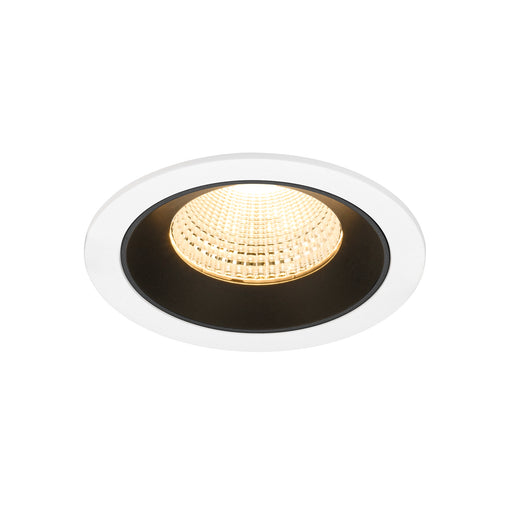 Recessed LED downlight with a white and black finish, featuring a textured glass lens and designed for ceiling mounting.