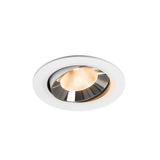 Recessed ceiling light fixture with a chrome finish, white metal housing, and warm LED illumination.