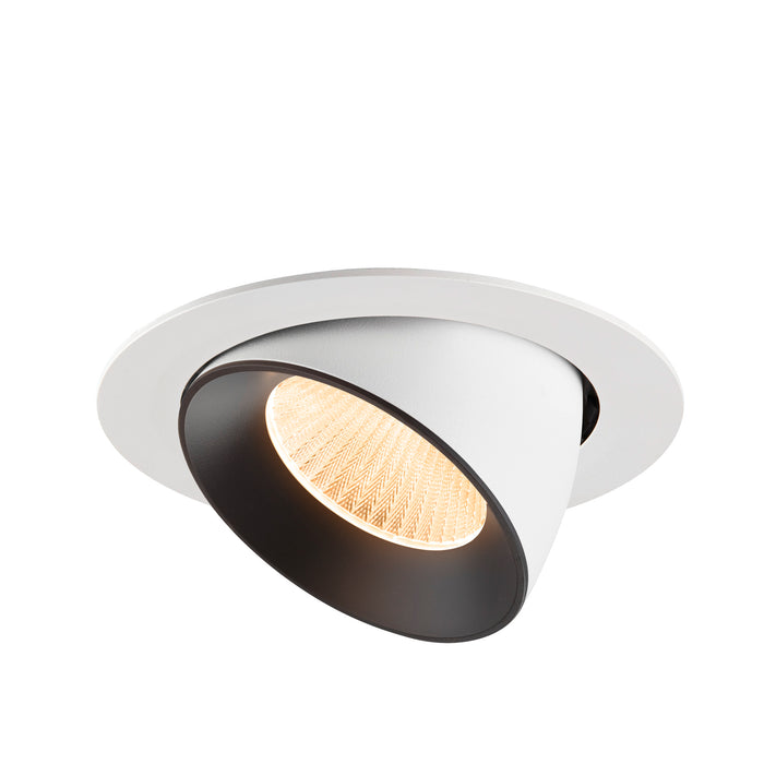 Recessed ceiling light fixture with a white metal finish and black interior, featuring a warm LED bulb and a modern design.