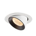 Recessed spotlight made of metal with a matte white finish and a black interior, featuring a warm LED bulb for focused lighting.