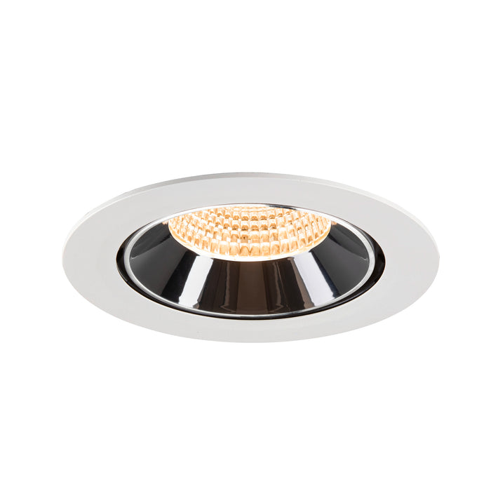 Recessed ceiling light fixture made of metal with a white finish and black reflector, featuring a warm LED bulb for efficient illumination.
