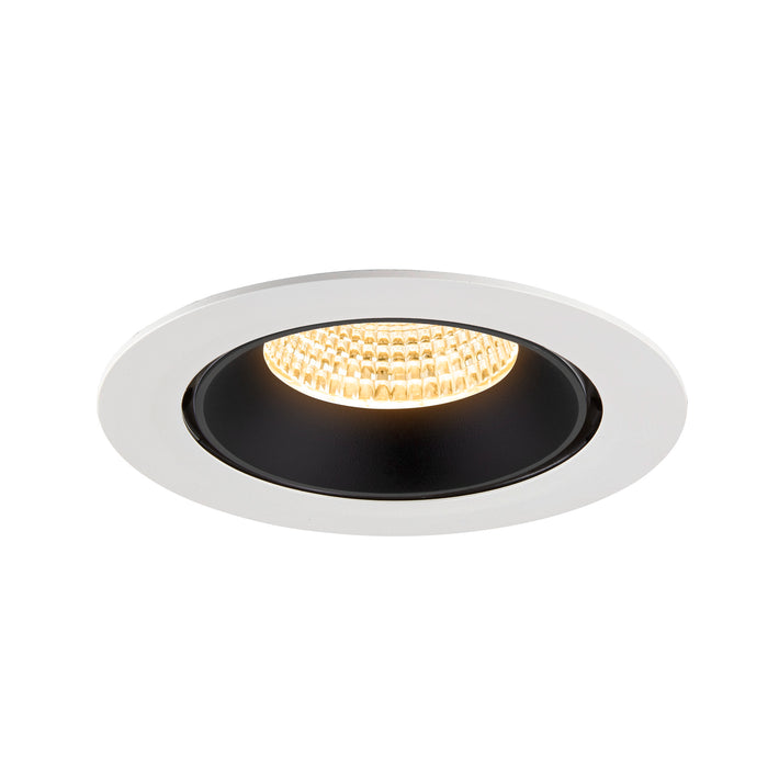 Recessed ceiling light fixture with a white finish, black interior, and warm LED bulb, designed for flush mounting.