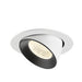 Recessed ceiling light fixture with a white metal finish and black interior, featuring a textured lens for focused illumination.