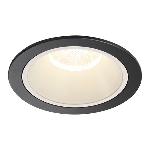 Recessed ceiling light fixture, metal with black finish, white trim, and warm light.