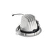 White recessed can light fixture with metal clips for ceiling mounting.