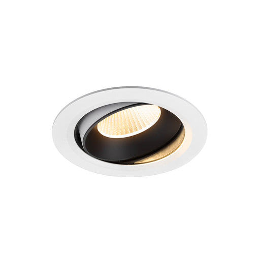 Recessed ceiling light fixture with a black and white finish, made of metal, featuring a warm LED bulb and a sleek, modern design.