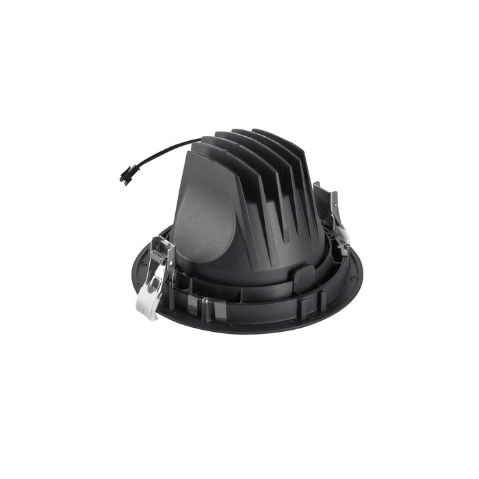 Black recessed can light fixture with metal mounting clips.