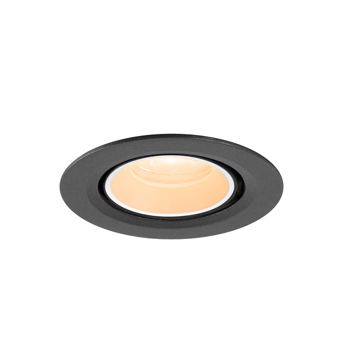 Recessed ceiling light fixture, metal with textured black finish.