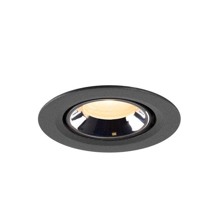 Recessed ceiling light fixture in black metal with a polished chrome reflector and warm white LED, designed for flush mounting.