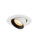 Recessed ceiling light fixture made of metal with a matte white finish and black interior, featuring a warm white LED bulb.