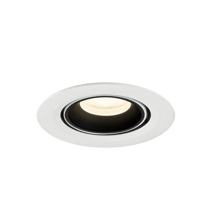 Recessed ceiling light fixture in white metal finish with a black interior, featuring a warm white LED bulb for modern lighting solutions.