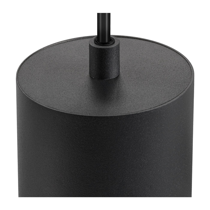 Close-up of a black cylinder pendant light fixture, metal with a textured finish.
