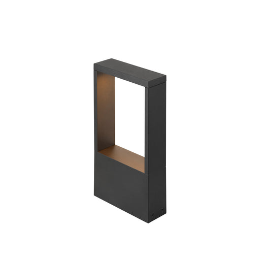 Black metal outdoor ground light fixture with a matte finish.