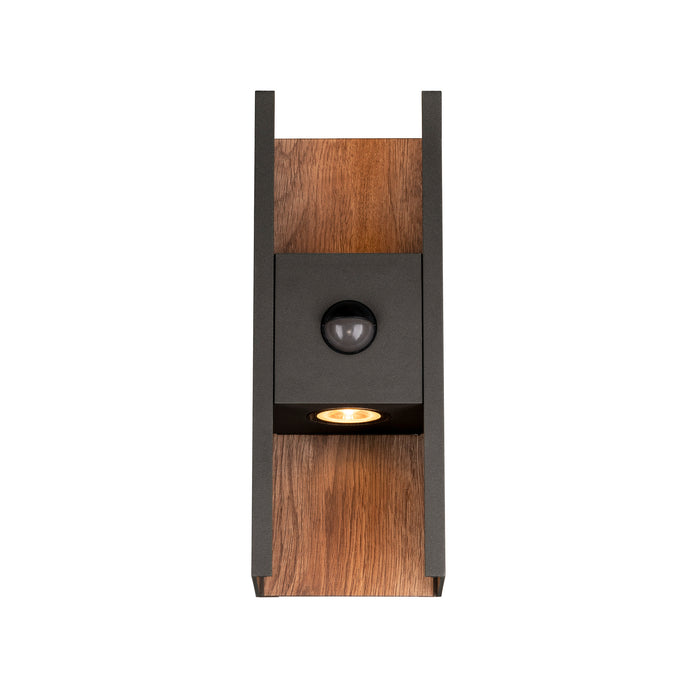 Wood and black metal wall sconce with integrated sensor.