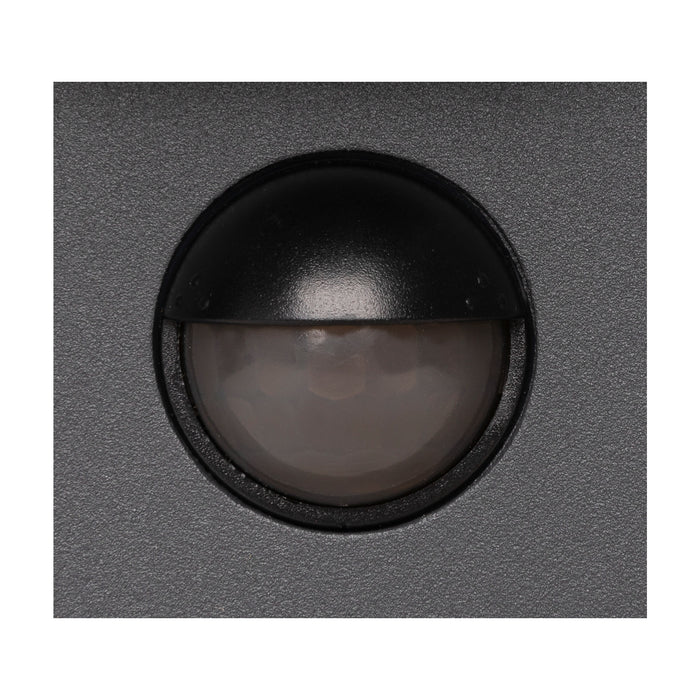 Black recessed step light, metal with textured finish.