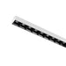 White recessed linear LED light fixture with black baffle.