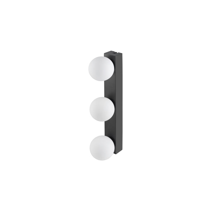 Black metal wall sconce with three white globe lights.