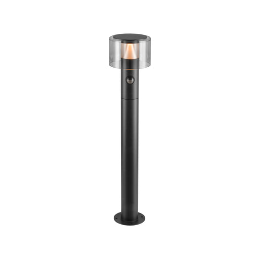 Black metal bollard light with clear shade, surface mounted.