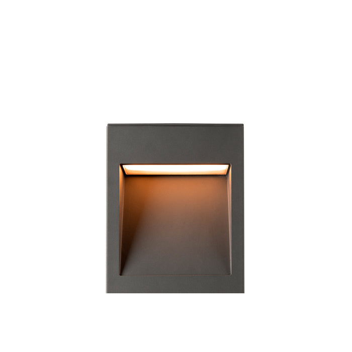 Aluminum step light with textured gray finish, recessed mounting.