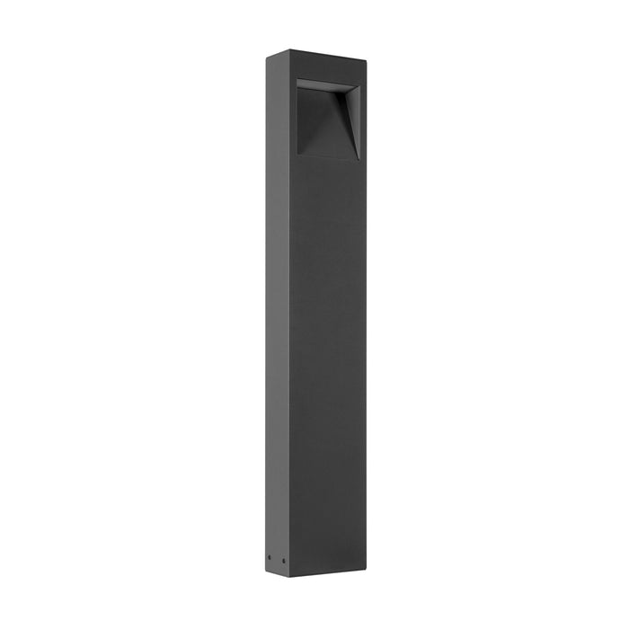 Modern dark gray aluminum bollard light fixture with textured finish, ground mounted.