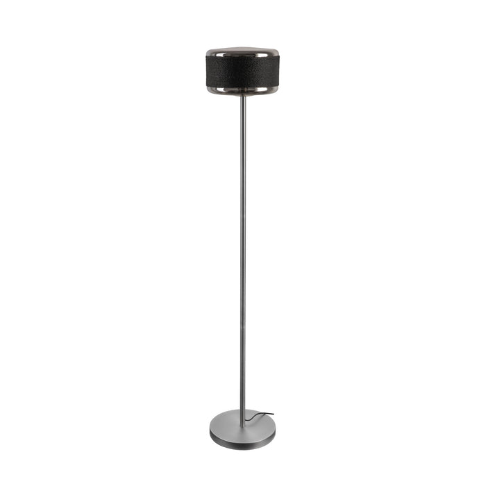 Floor lamp with black woven shade and brushed silver metal base.