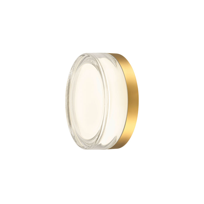 Round glass wall sconce with a gold finish.