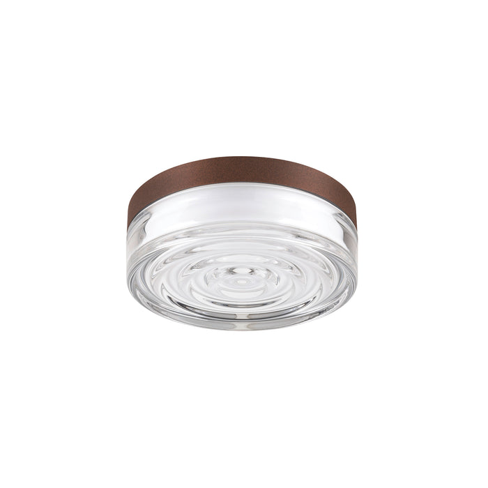 Clear glass flush mount ceiling light with bronze-colored trim.