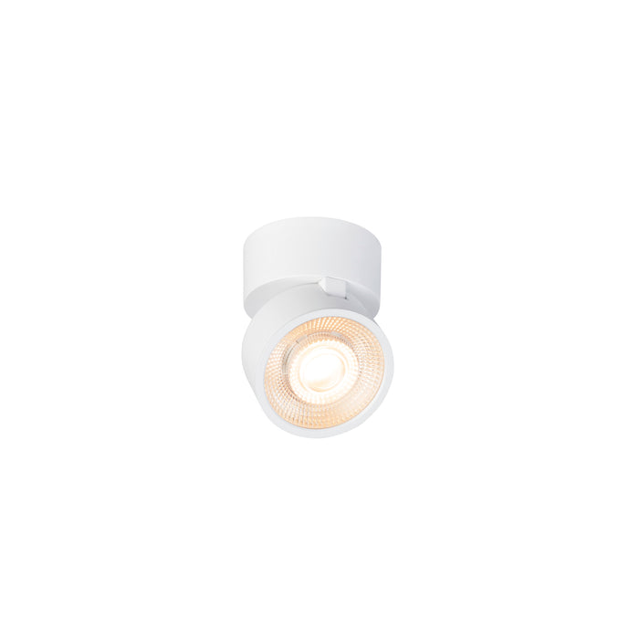 White surface-mounted spotlight fixture with adjustable head.