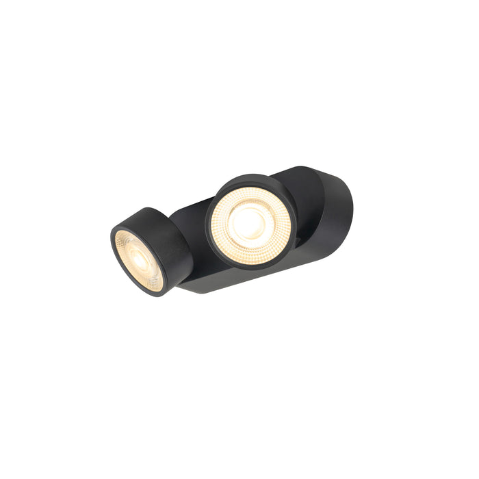 Black metal wall-mounted spotlight fixture with two adjustable heads.