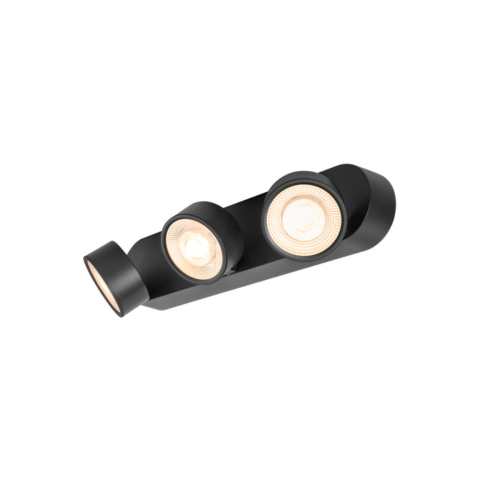 Black metal track lighting fixture with three adjustable spotlights.