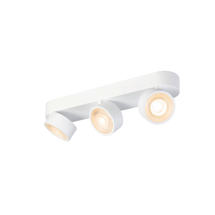White metal track lighting fixture with three adjustable spotlights, surface mounted.
