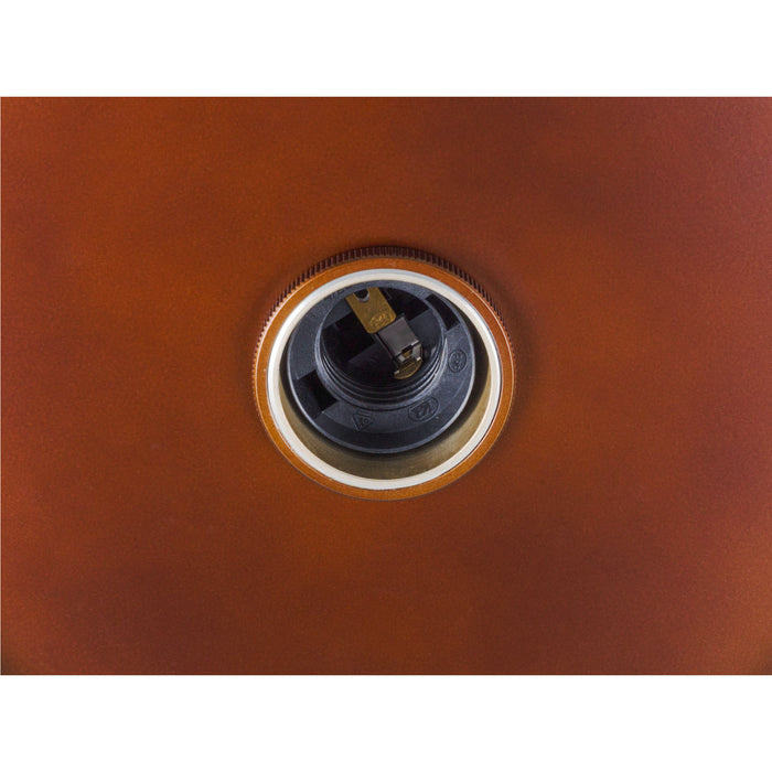 Close-up of a flush mount light fixture in copper finish, showing the black plastic socket.