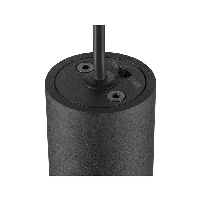 Close-up of a black cylinder pendant light with a textured finish and a 2700K/3000K color temperature switch.