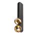 Modern wall sconce with two gold faceted spheres on a black metal mount.