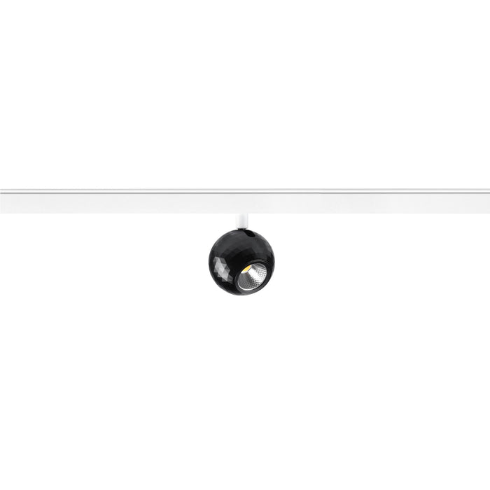 Black faceted sphere track light fixture.