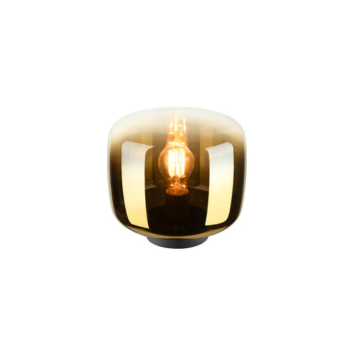 Glass table lamp with a gold ombre finish and black base.