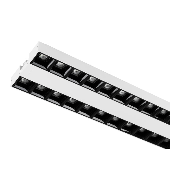 Recessed linear light fixture, white finish, with black baffles.