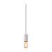 Concrete pendant light fixture with exposed bulb and black cord.