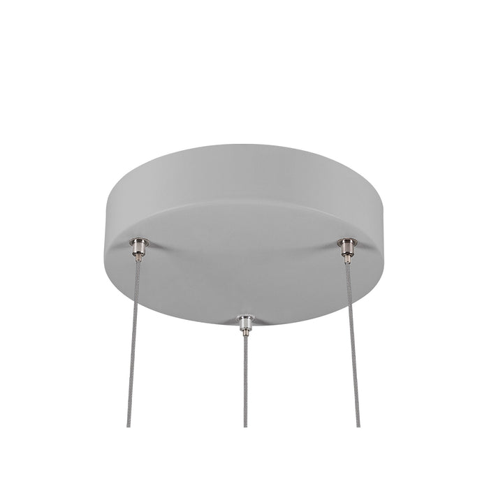 Ceiling mount of a gray pendant light fixture, showing the round canopy and three suspension cables.