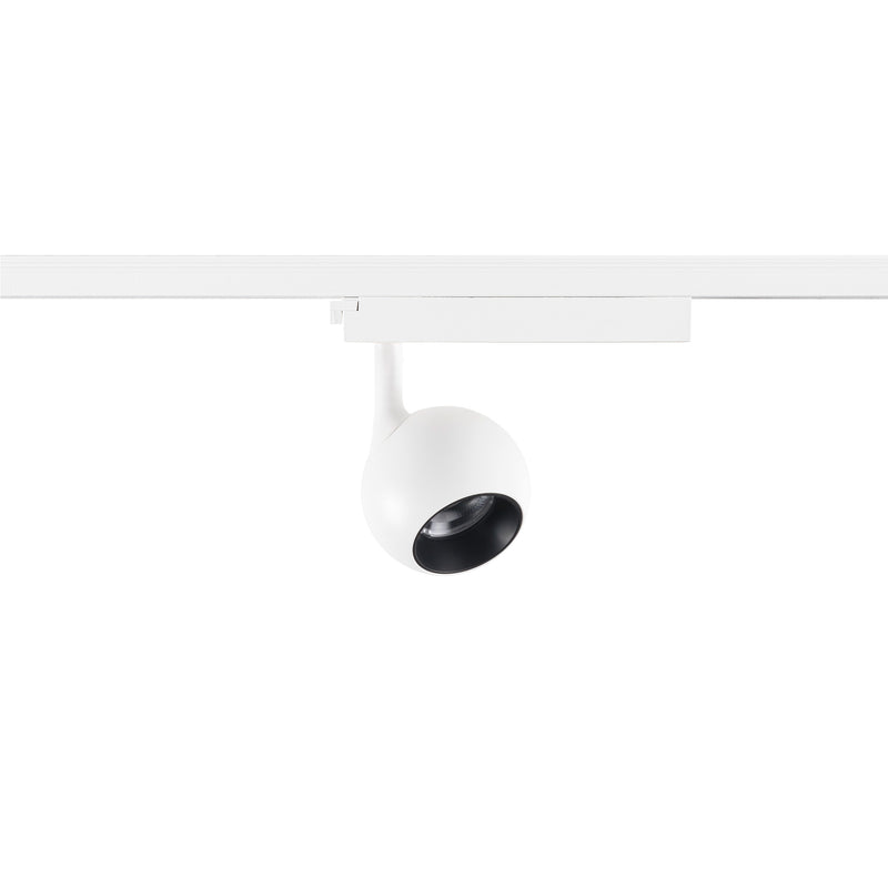 White track lighting fixture, round head, surface mounted.