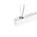 White aluminum linear LED pendant light fixture with cable suspension.