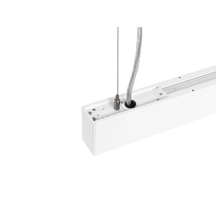 White aluminum linear LED pendant light fixture with cable suspension.